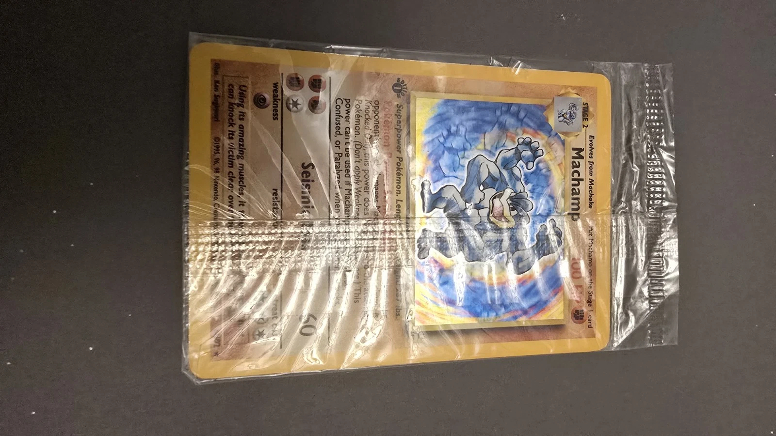 Deal for Pokemon 1999 Machamp Base Set 1st Edition Holo Rare #8/102 Sealed