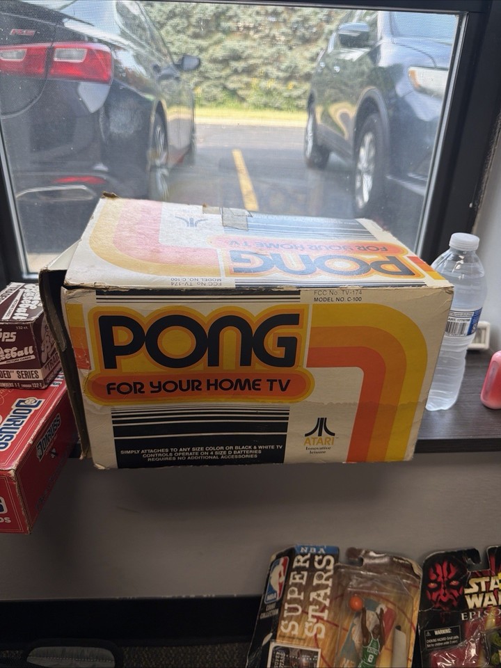 Original Atari Pong C-100 in its original box — the console that literally started the video game industry, pristinely packaged for maximum wow factor.