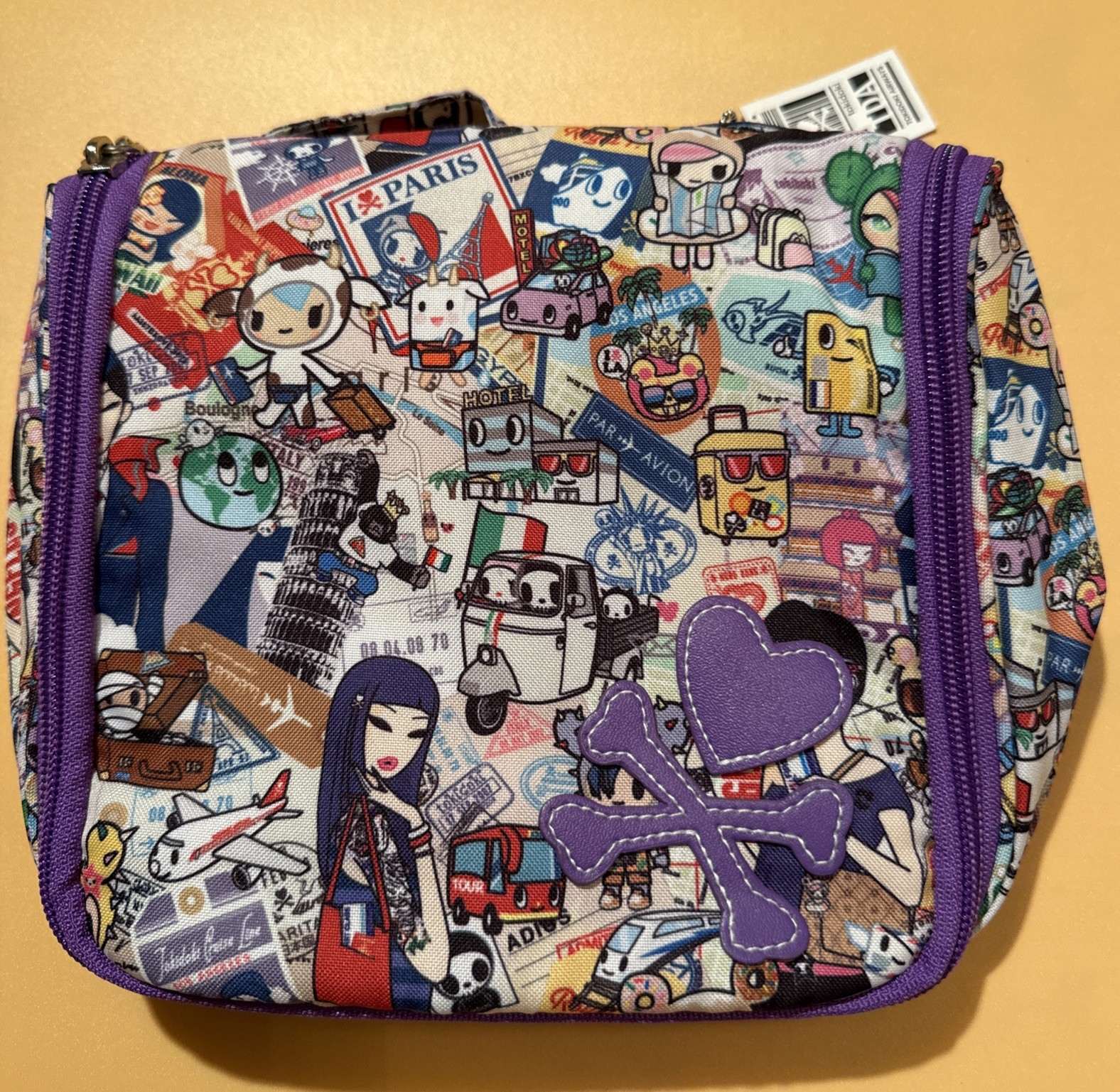 Estuche de viaje plegable para artículos de tocador cosméticos Tokidoki “Around The World” con percha