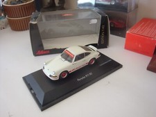 SCHUCO - 03553 - PORSCHE 911 RS 2.7 touring  blanche à bande rouge  1973