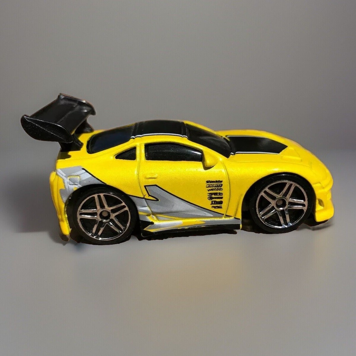 HOT WHEELS 2003 DIE CAST TOYOTA SUPRA METALLIC YELLOW & BLACK
