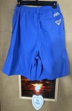Columbia Omni-Shade PFG men s blue swim trunks M 8L pockets solid mesh brief lin