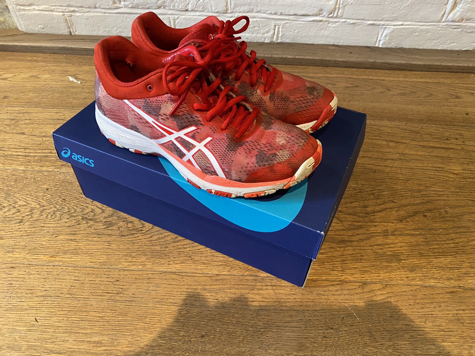 asics gel professional 14 ff orange netball trainers