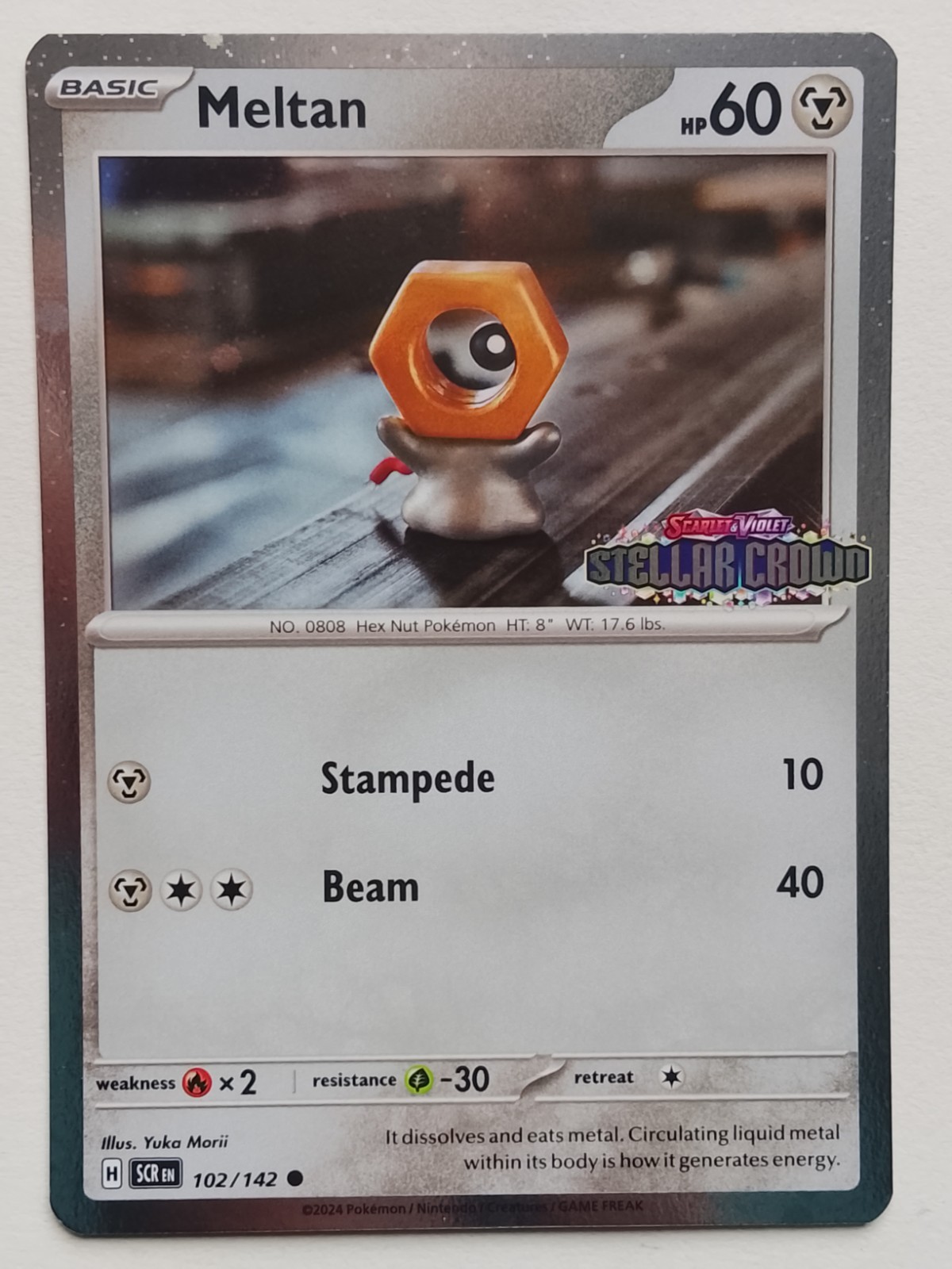 Meltan 102/142 STAMPED - Stellar Crown pokemon TCG NM