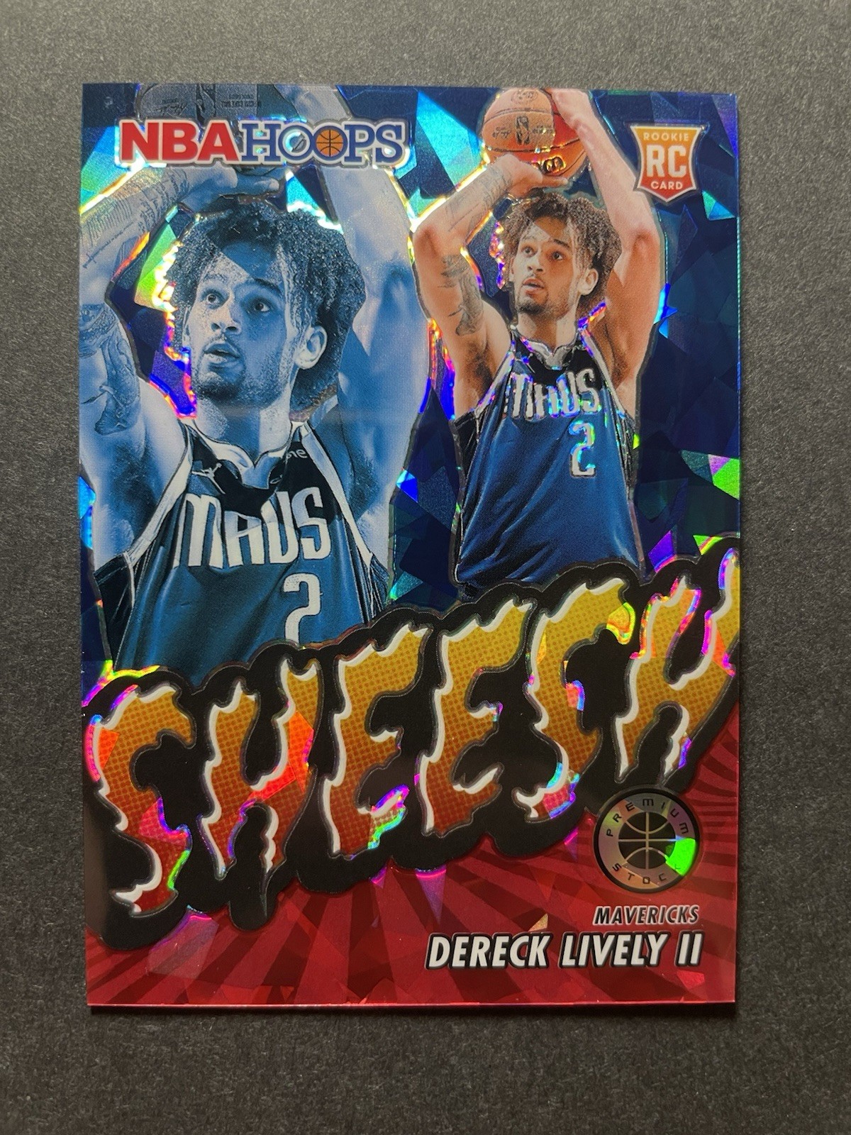 2023-24 NBA Hoops Premium Stock Dereck Lively II Sheesh Red Ice RC /99 #13