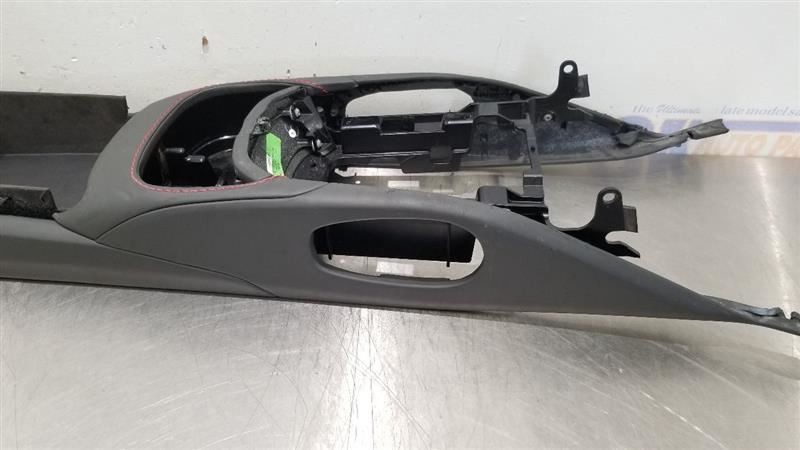 19 ASTON MARTIN VANTAGE FRONT CENTER CONSOLE BASE BLACK LEATHER RED STITCHING