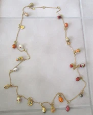 Joan Rivers 49" Connect Necklace 22 Charms Signed Over The Head 49" Necklace