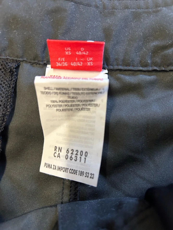 Pantalones cortos de tabla para hombre PUMA negros Scuderia Ferrari 10 aniversario talla XS Foto 2 de 4