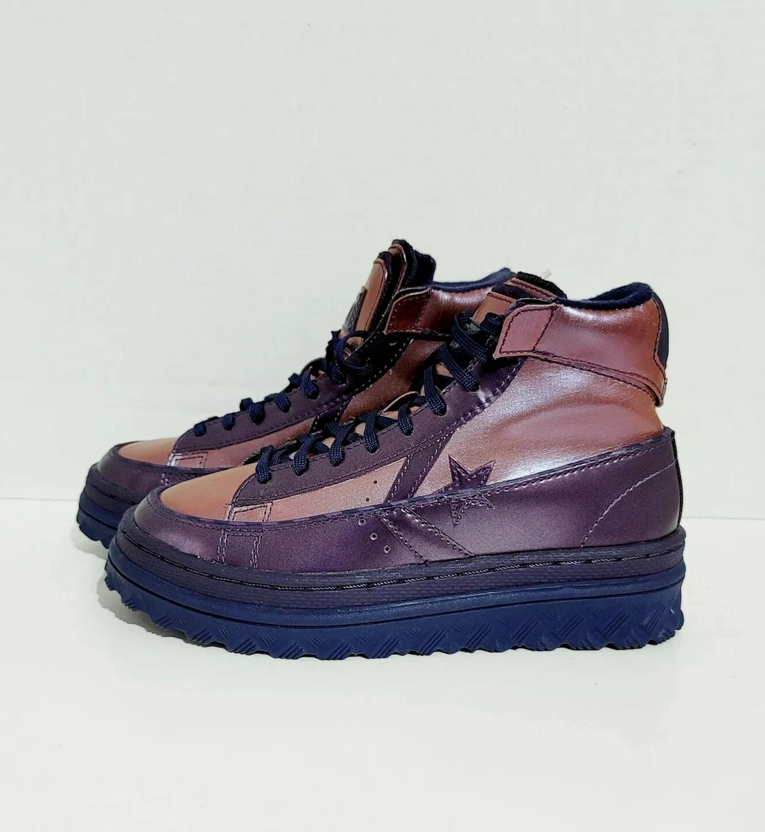 Purple leather best sale converse