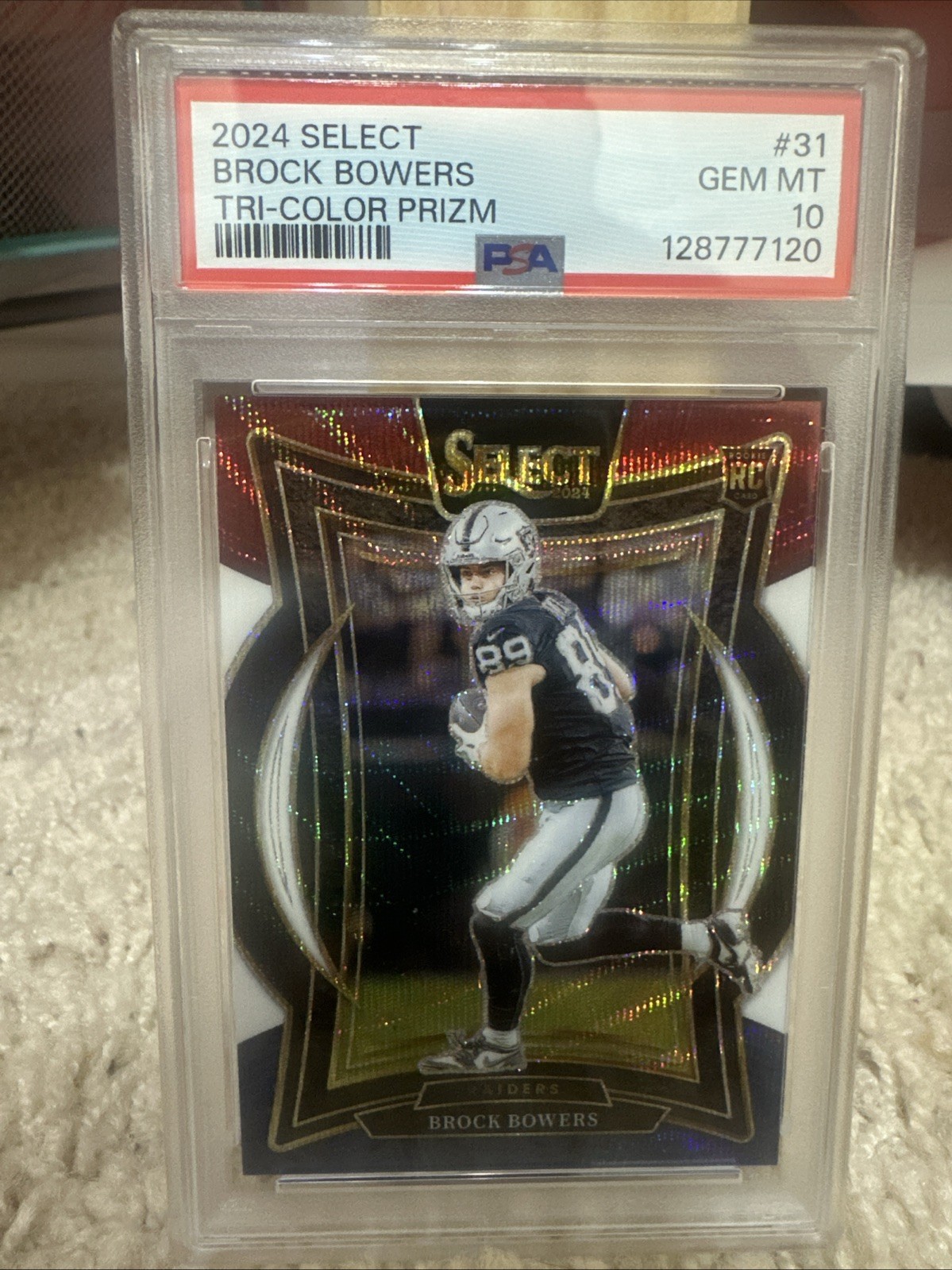 2024 Panini Select Concourse Brock Bowers Tri-Color Prizm /299 (RC) PSA 10