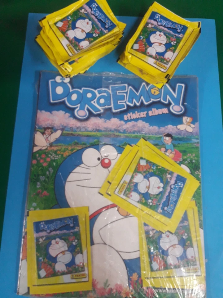 Doraemon Album vuoto sigillato + 50 bustine di figurine Panini 2004