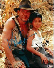 HARRISON FORD & KE HUY QUAN SIGNED INDIANA JONES 14x11 PHOTO (ACG CERT AG16698)