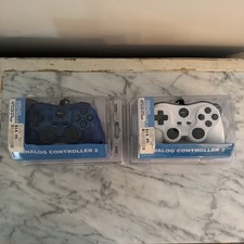 Lot of 2 TTX Tech PS2 & PS1 Analog Controller...