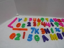 MIXED BAG OF COLORFUL MAGNETIC LETTERS AND NUMBERS
