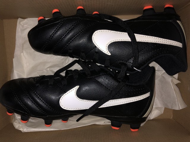 black tiempo cleats