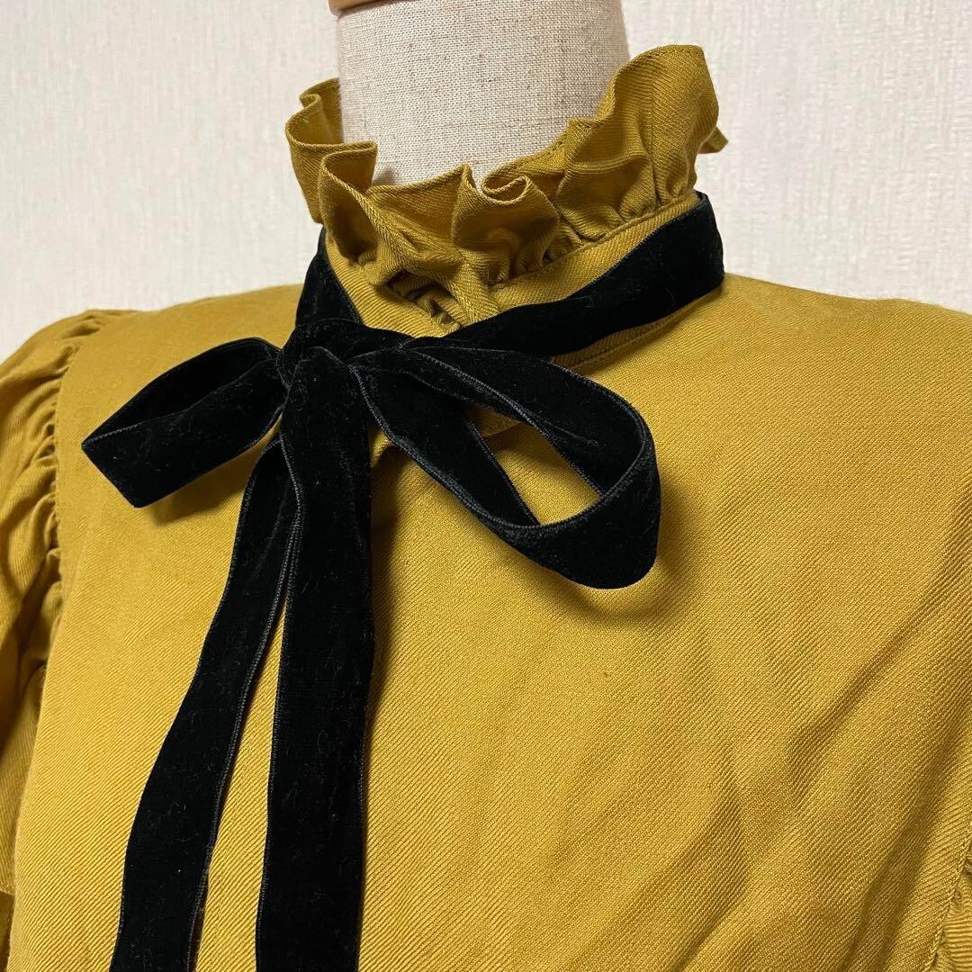 Blusa Yves Saint Laurent con volant a nastro vintage lana gialla taglia S usata