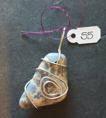 Hand Crafted Wire Wrapped Stone Pendants. Sodalite pendant?