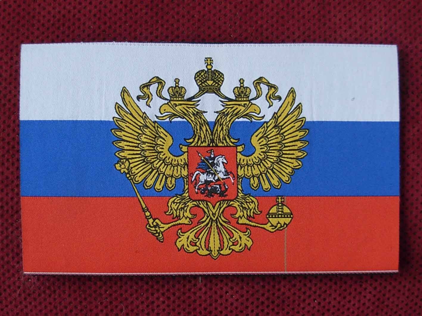 Russian Satin Flag With Coat of Arms of Russia. Waving Fabric