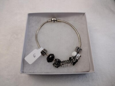 Authentic Pandora Bracelet, with 2 S Clip and 5 charms, all