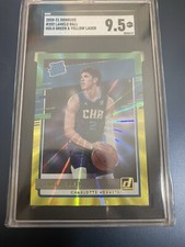 2020-21 Donruss Holo Green Yellow Laser 202 LaMelo Ball RatedRookie SGC 9.5 MINT