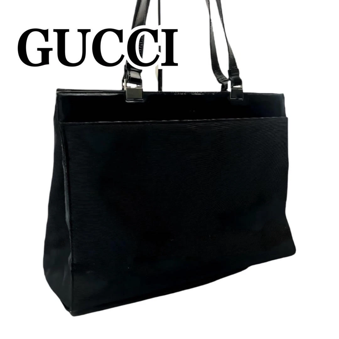 Sac fourre tout Gucci cuir verni gaufré noir A4