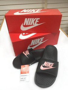 rose gold nike flip flops