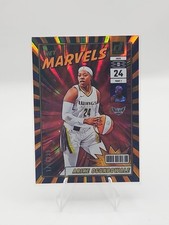 2025 Panini Donruss Net Marvels Orange Laser #21 Arike Ogunbowale /399 Wings