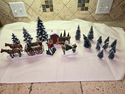 Set of 18 Christmas Village. Includes 6 Dept 56, 2 Lemax, & 11 Unknown Trees.