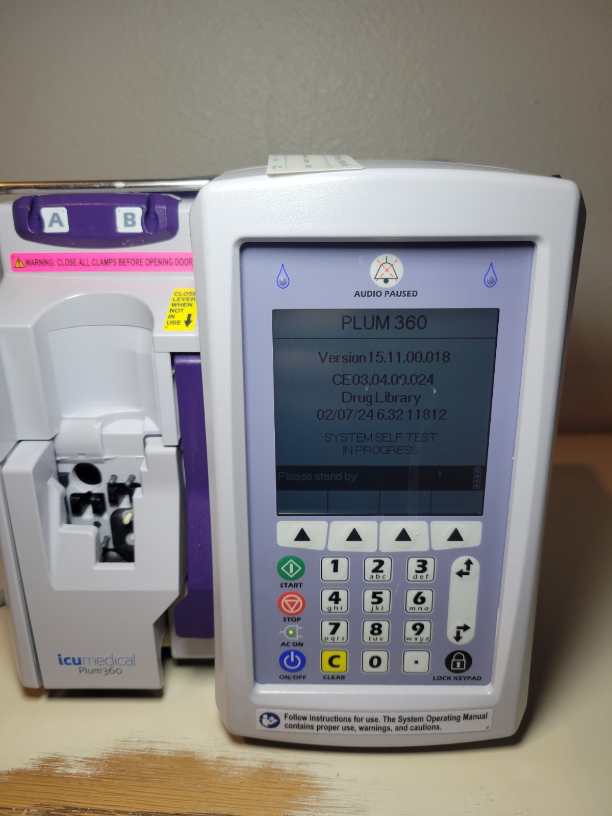 ICU Medical Plum 360 Infusion IV Pump W/Pole And Clamp Version 15.11.00.018