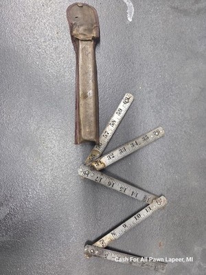 The Lufkin Rule Co No. 1176 Metal Folding Ruler 72'' Saginaw, MI leather case
