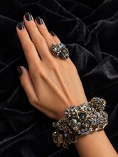 Betsy Johnson Bold floral bracelet by Betsey Johnson. Gold-tone metal with layer
