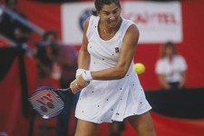 Monica Seles hits the ball at the 1995 du Maurier Tennis Open- Old Photo