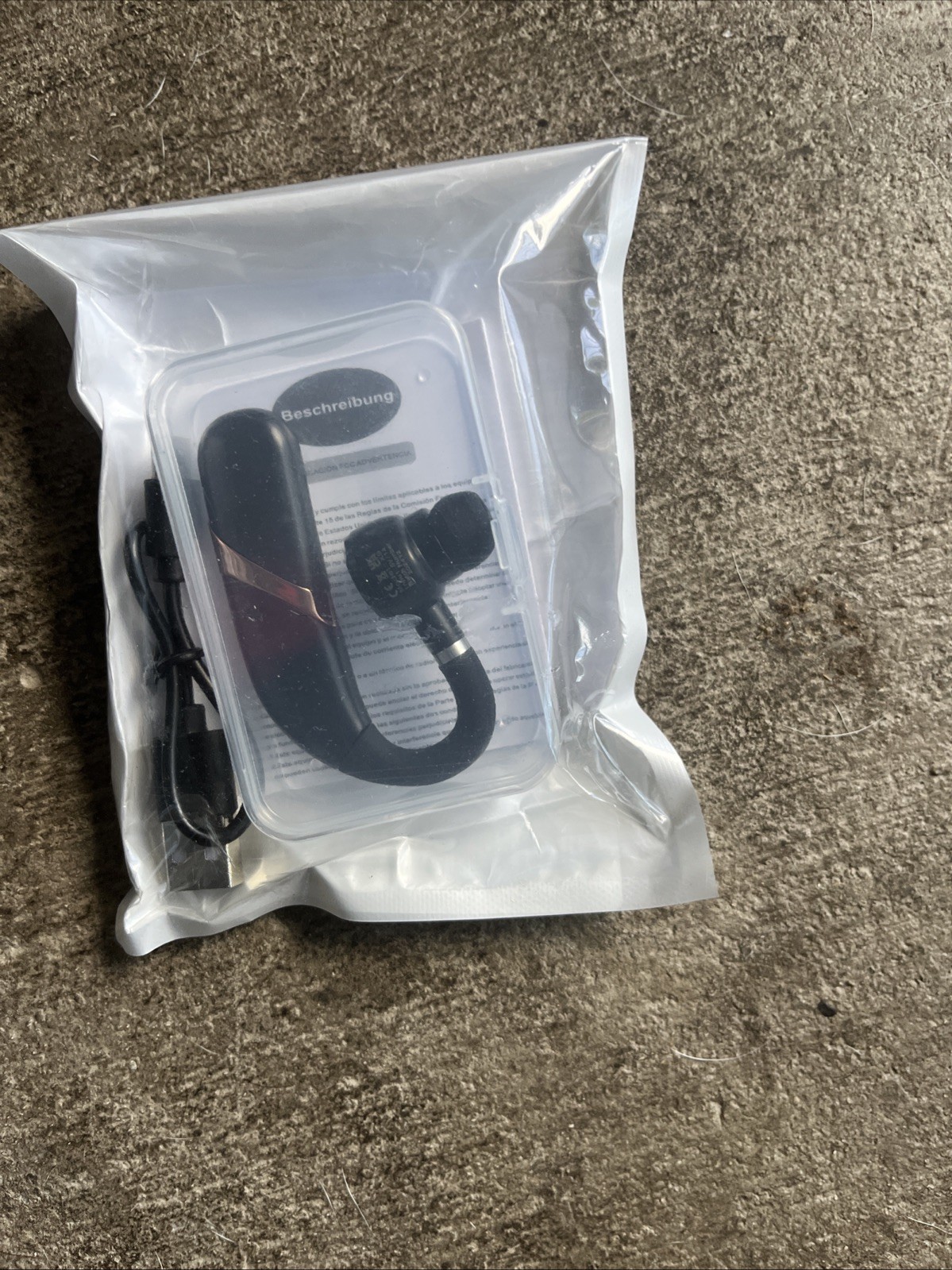 wireless earbud likely designed for single-ear use, housed i