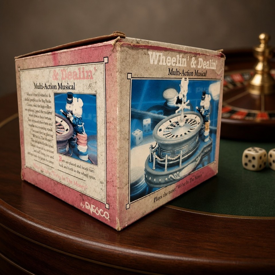 A 1993 ENESCO multi-action musical box themed around car dealing — gears turn, figures move, and it's delightfully absurd niche kitsch.