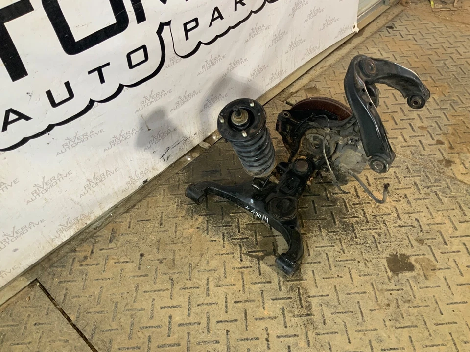 Nissan Xterra 2005 2006 07-2015 pasajero delantero suspensión de rodilla fabricante de equipos originales 194 k millas Foto 2 de 4