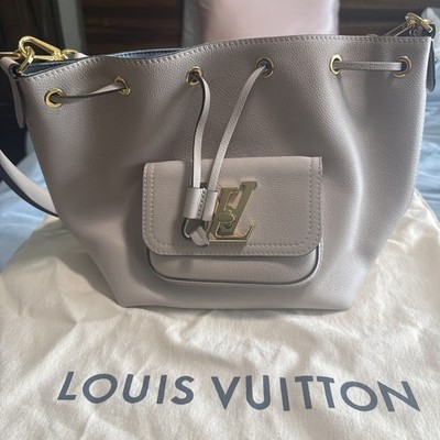 Authentic Louis Vuitton Lockme Bucket Bag (Product #M57688)   Greige