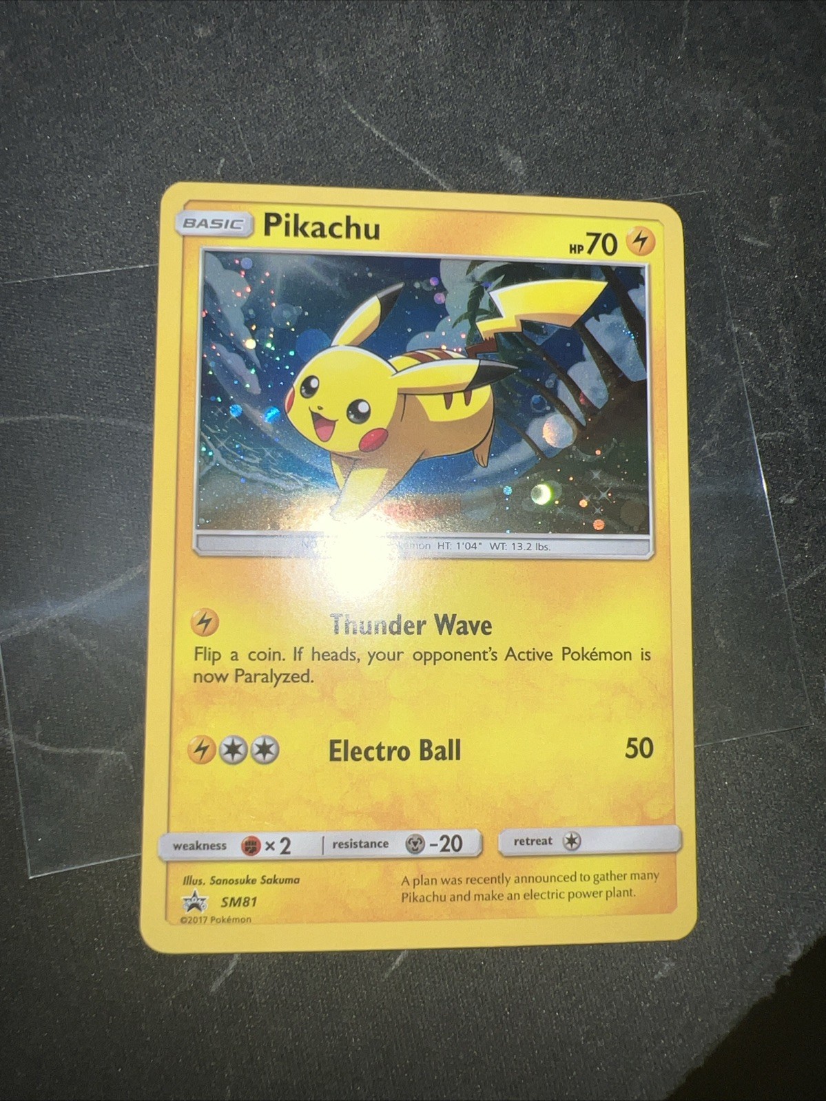 Near Mint - Pokémon TCG 2017 Pikachu SM81 Sun & Moon Promo Cosmos Holo