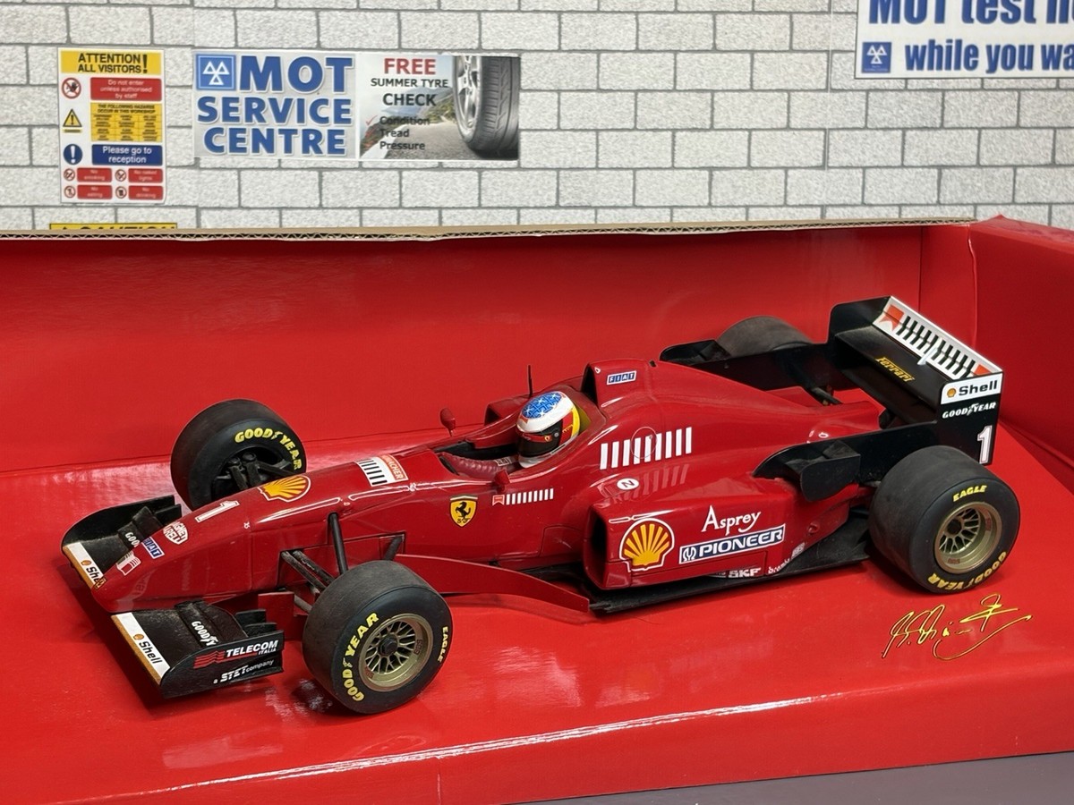 F1 Ferrari F310 #1 Schumacher – Barcelone 1996, 1/18 Minichamps (excellent état)