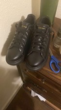 Black and gold alexander mcqueens size 44 US(10)