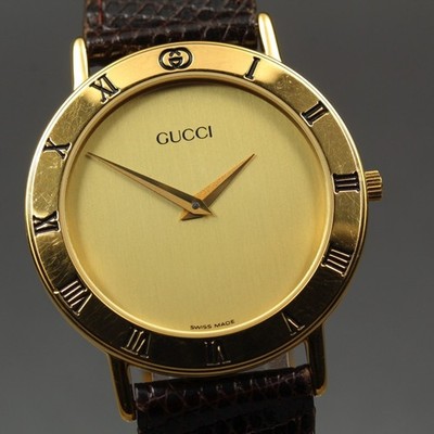 Near MINT GUCCI 3000.2.M Gold Plated Roman Quartz 33mm Men's Dress Watch