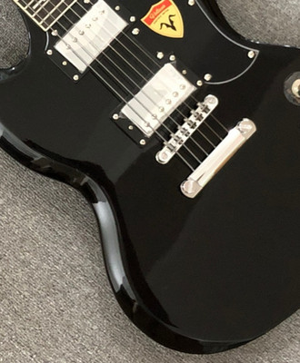 Standard, black electric guitar, chrome hardware, rosewood fingerboard 22 frets