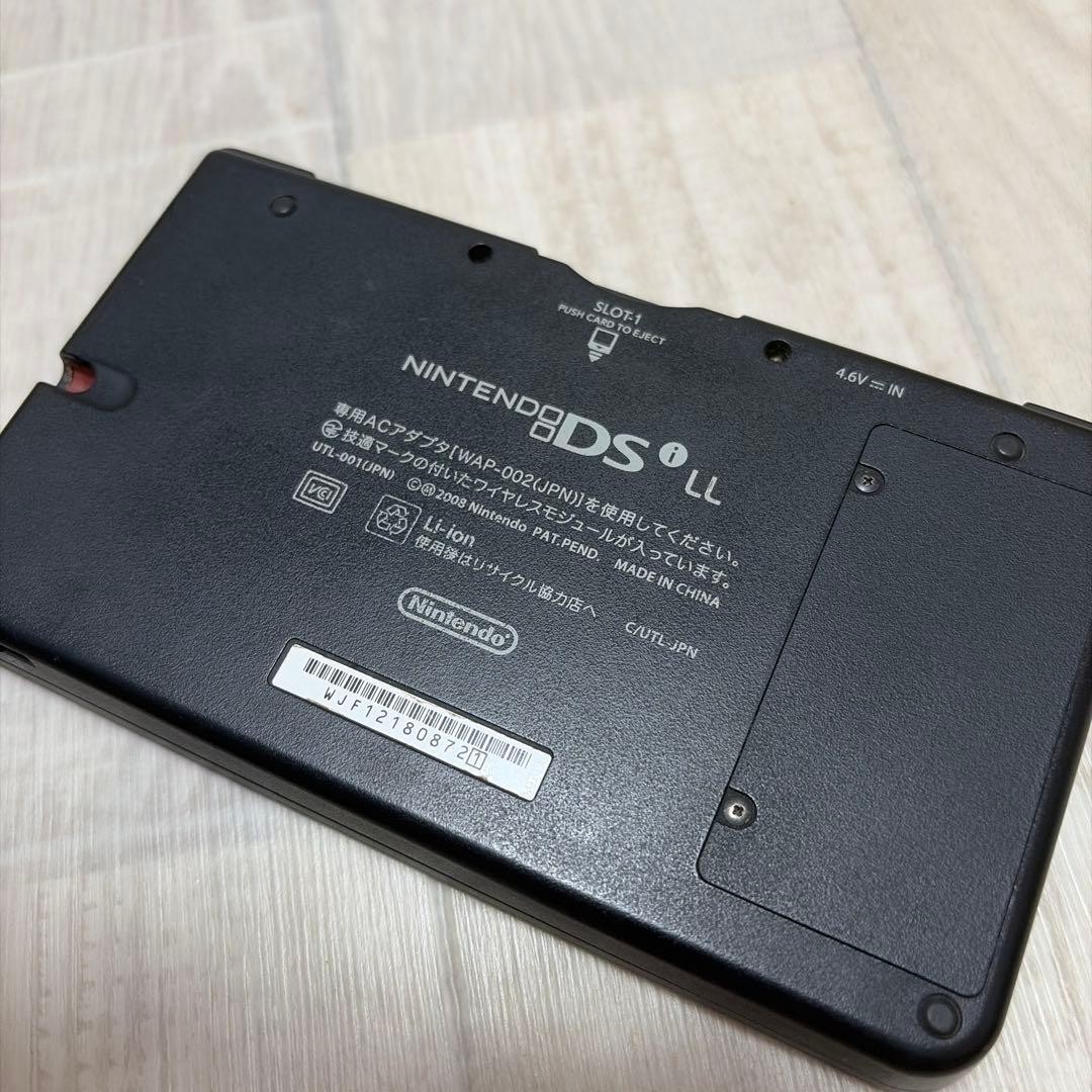 Nintendo DSi XL 25th Anniversary Edition with New Mario Bros. Red