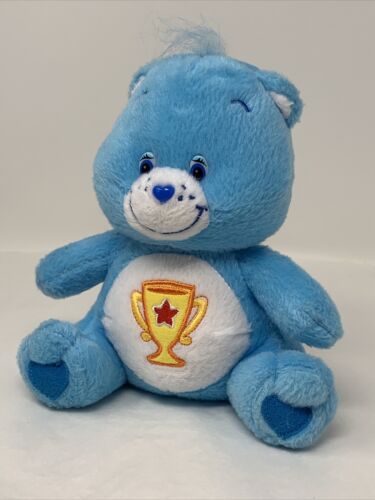 Juguete de peluche Care Bears Champ Bear azul con premio trofeo 2004 Nanco - Imagen 5 de 10