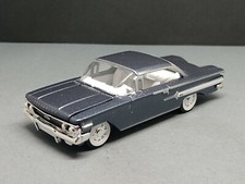 A 1960 Chevrolet Impala Adult Collectible 164 Scale Limited Edition Classic Car