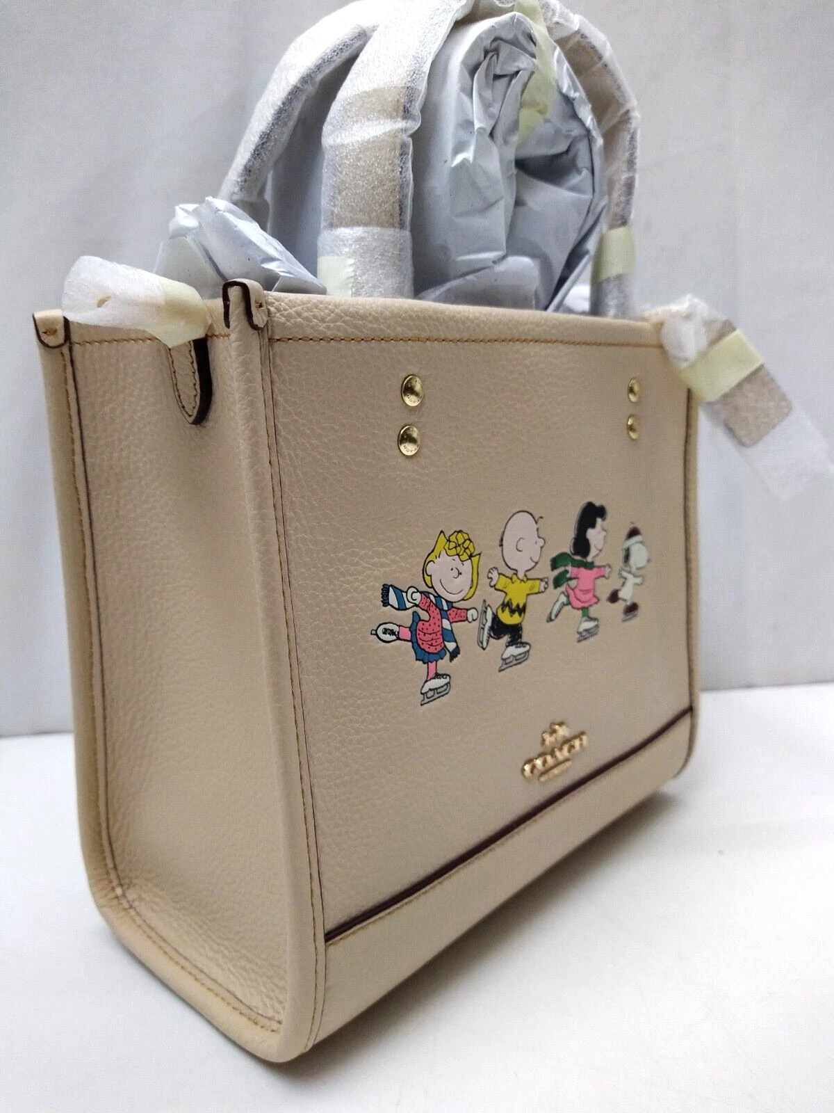 Borsa Coach Limited Ed X Peanuts Dempsey 22 con motivo Snoopy and Friends Nuova con etichette