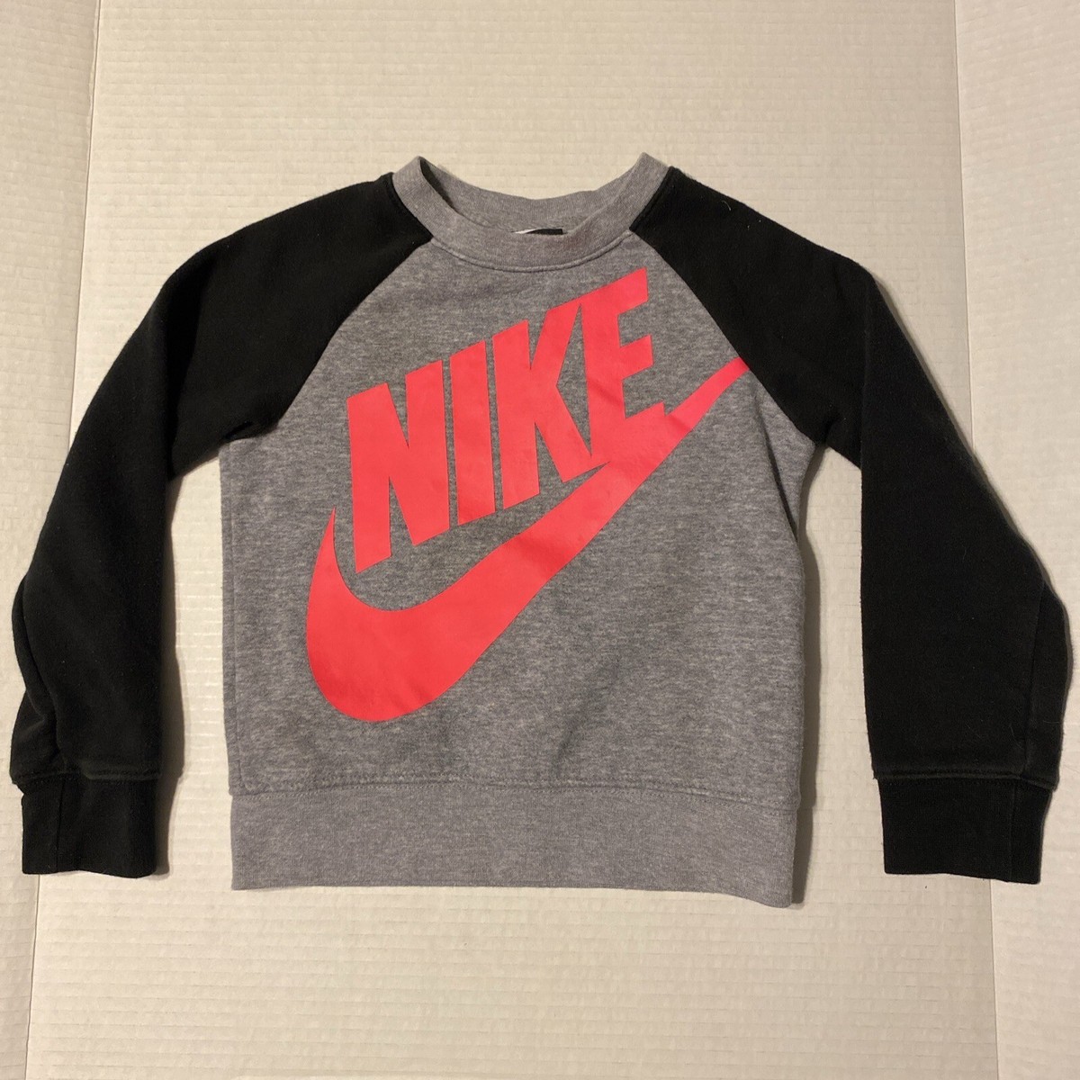 nike sweatshirt with little swooshes