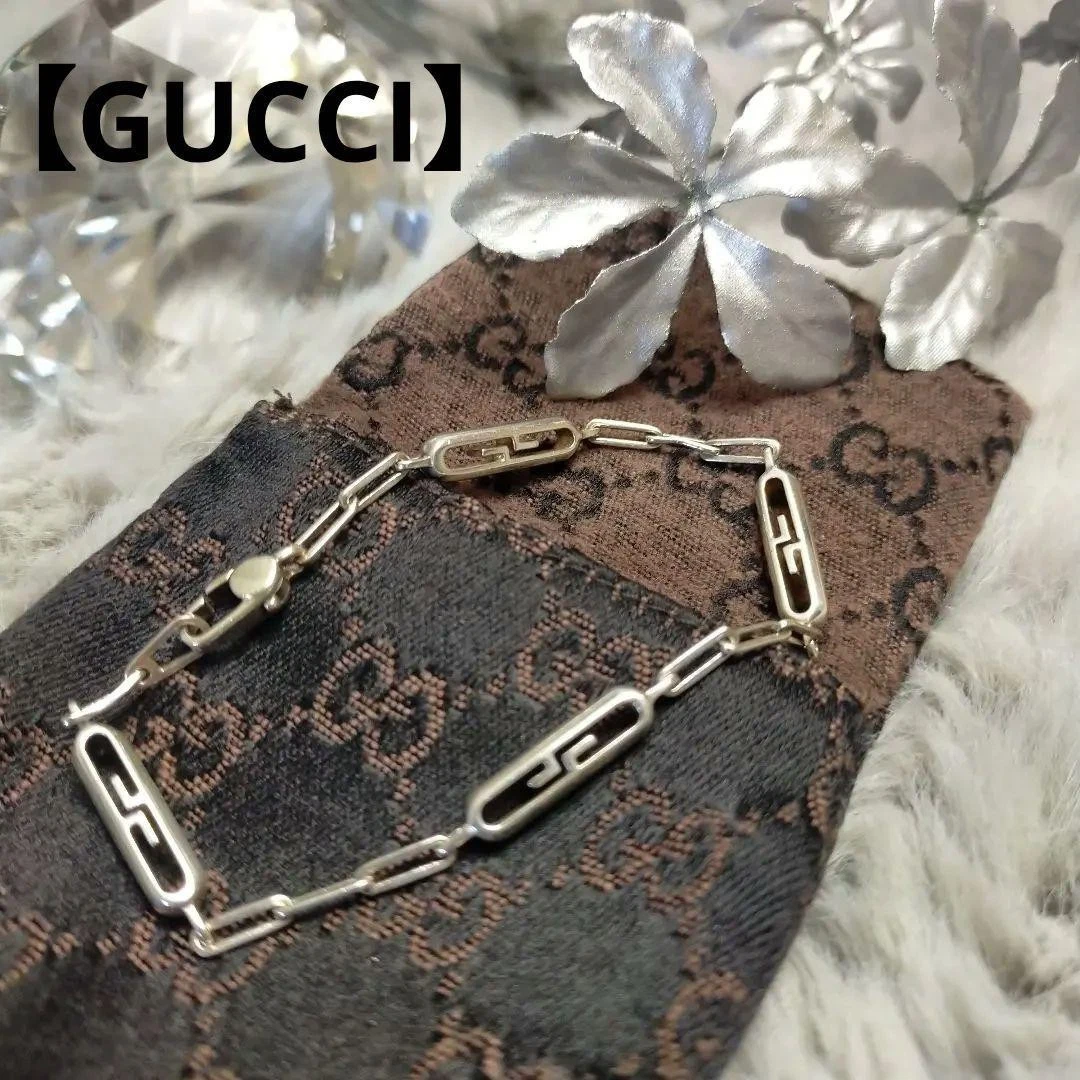 Autentico bracciale Gucci in argento con incisione e marsupio buone condizioni
