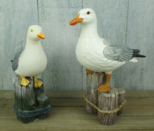 2er Set Deko M&ouml;wen - M&ouml;we auf 3er Poller & Holzoptik - maritime Figur II.Wahl