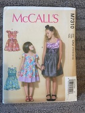 McCalls Pattern M7310 Girls Dresses w/Front Pleated Bodice  w/Variations Sz 7-14