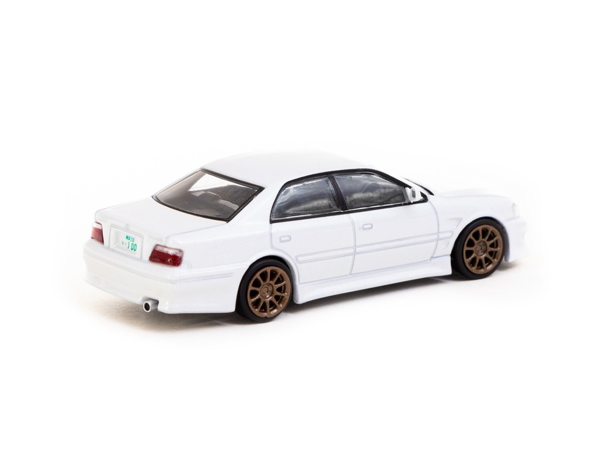 Tarmac Works 1:64 Vertex Toyota Chaser JZX100 white metallic die